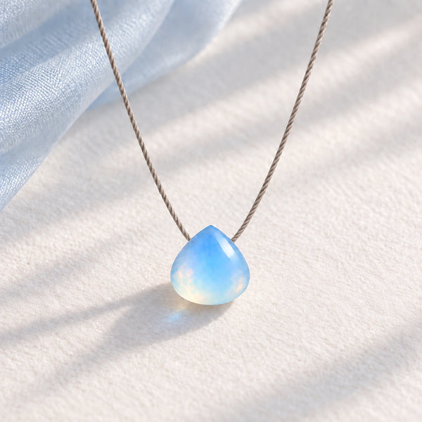 Opal Fine Cord Necklace - hero photograph on a styled surface