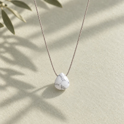 Howlite Fine Cord Necklace - hero photograph on a styled surface