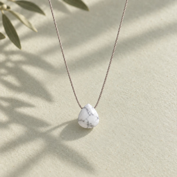 Howlite Fine Cord Necklace - hero photograph on a styled surface
