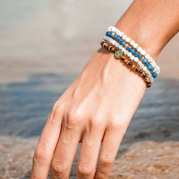 Soultheory Abundance four-bracelet crystal stack, fine 4 mm worn photograph