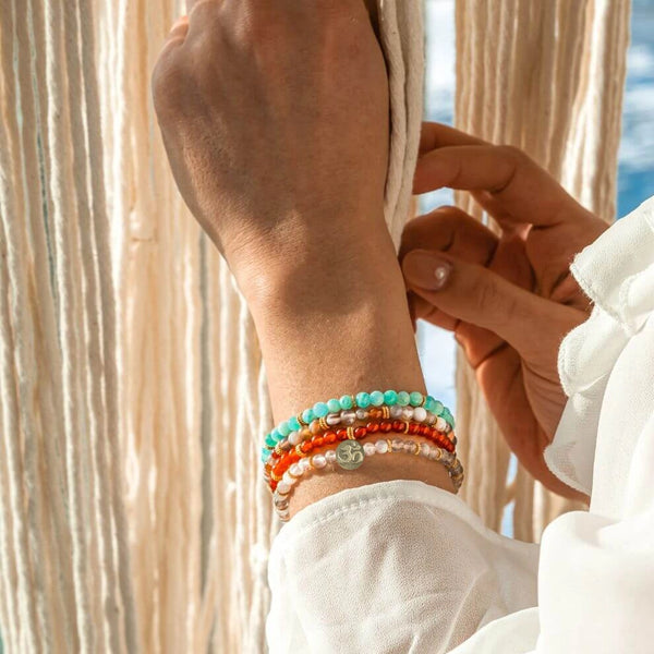 Soultheory Healthy four-bracelet crystal stack, fine 4 mm worn photograph