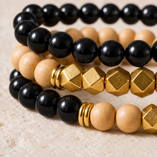 Macro close-up of Black Onyx beads, rosewood and gold-tone accents