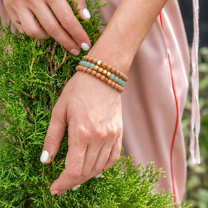 Green Aventurine and Rosewood set of 3 bracelets worn on a female wrist