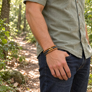 Hematite and Rosewood set of 3 bracelets worn on a male wrist
