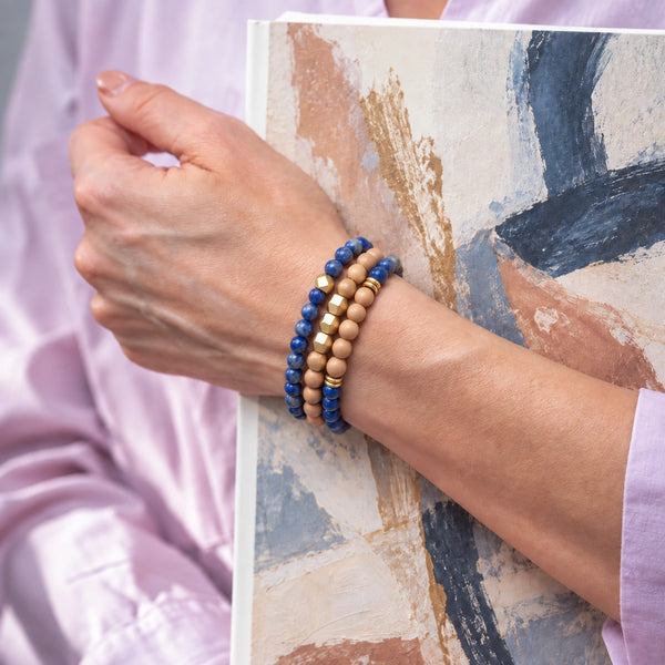 Lapis Lazuli and Rosewood set of 3 bracelets worn on a female wrist