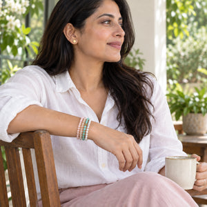 Soultheory Stress 4 mm bracelet stack with Pink Opal, Amazonite - candid lifestyle photograph
