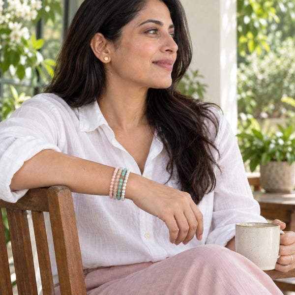 Soultheory Stress 4 mm bracelet stack with Pink Opal, Amazonite - candid lifestyle photograph