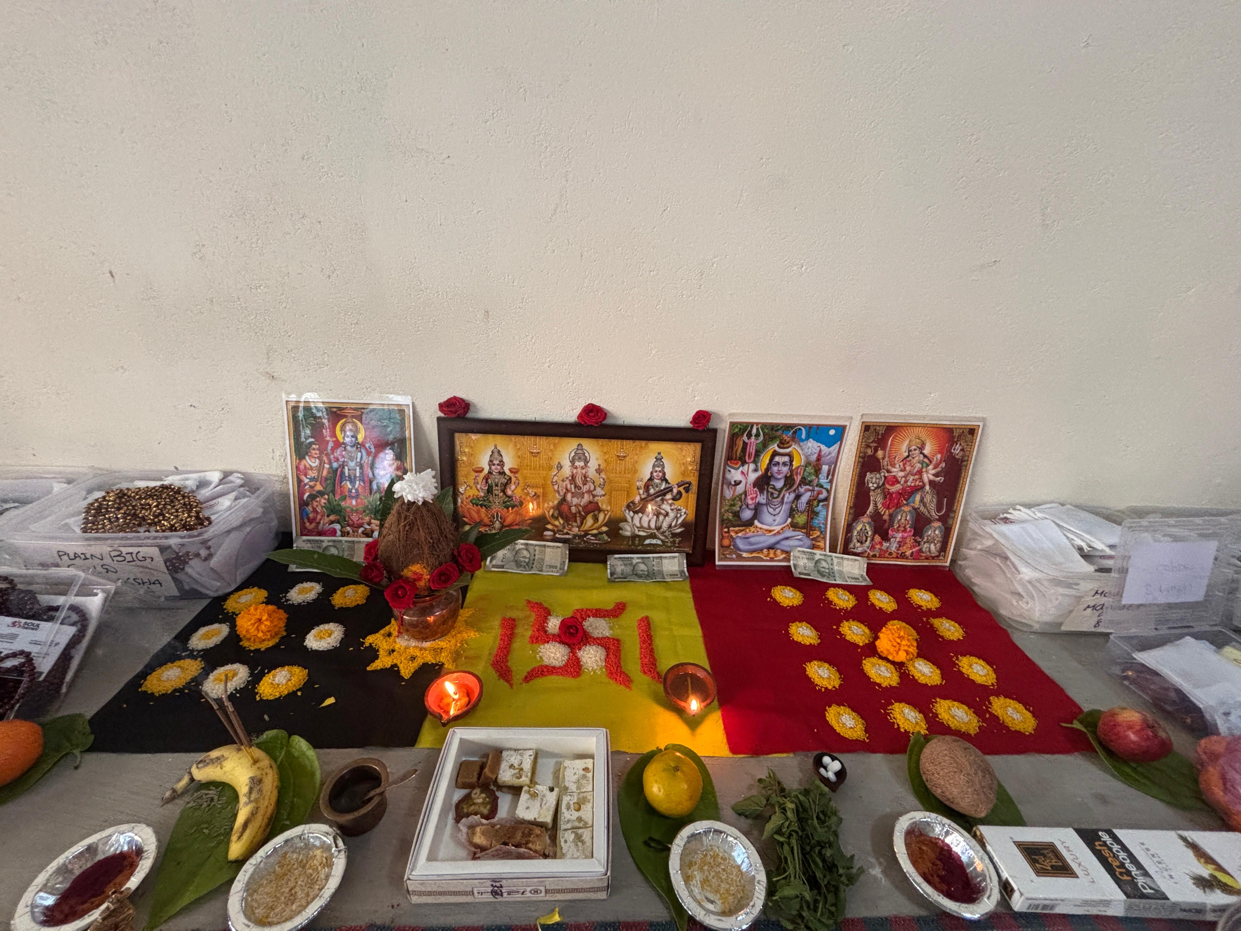 Soultheory February 2026 ritual altar with flowers, diyas and deities